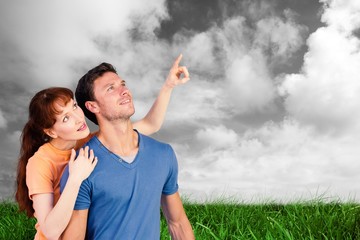 Aufkleber - Composite image of happy couple looking upwards