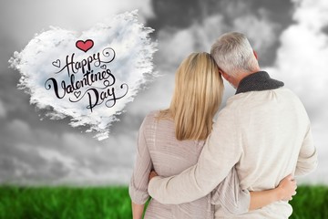 Aufkleber - Composite image of happy couple standing with arms around