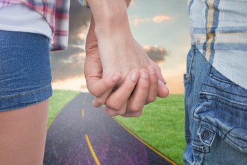 Poster - Couple in check shirts and denim holding hands