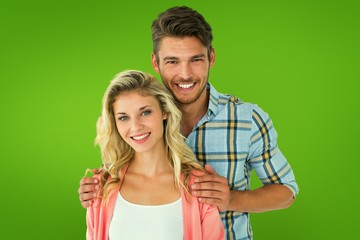Poster - Composite image of attractive young couple smiling at camera