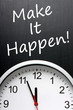 The phrase Make It Happen on a blackboard with a clock