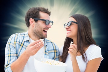 Poster - Composite image of attractive young couple watching a 3d movie