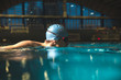 © BalanceFormCreative - Male swimmer  at the swimming pool.