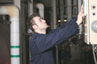 © Louis-Paul Photo - maintenance engineer checking technical data of heating system e