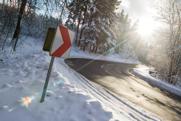 Wall Mural - danger curvy winter street sign