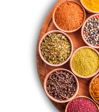 Assorted Spices In A Wooden Bowl
