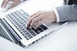 © Nonwarit - Closeup of businessman hands typing on laptop computer