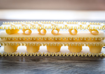 Canvas Print - Various types of pasta on lasagne sheets