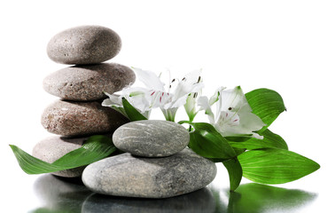 Wall Mural - Spa stones with flowers isolated on white