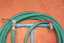 Two Way Faucet With Green Hose