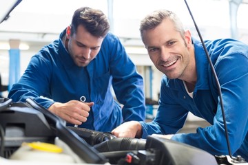 Poster - Team of mechanics working together
