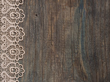Lace On The Wooden Background