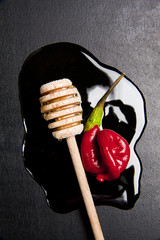 honey & red pepper on black