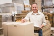 © WavebreakmediaMicro - Warehouse worker checking his list on clipboard