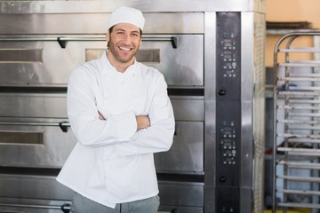 smiling baker looking at camera