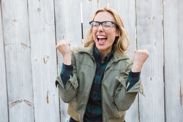 Poster - Blonde in glasses shouting and cheering