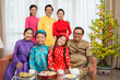 © DragonImages - Vietnamese family in national costumes
