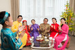 © DragonImages - Applauding family