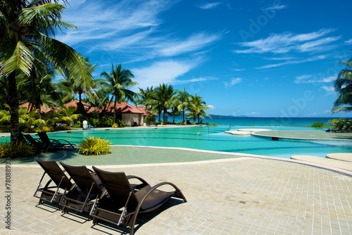 Fotografie, Obraz Swimming pool vacation resort with recliner in Boracay