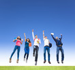 © Tom Wang - Happy young group of students jumping together