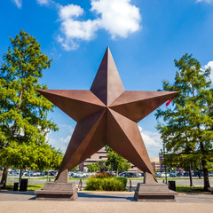 Fototapete - Texas Star in front of the Bob Bullock Texas State History Museu
