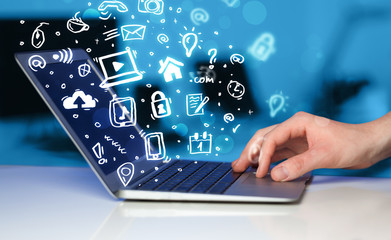 Aufkleber - Hand writing on notebook computer with media icons and symbols