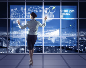 Wall Mural - businesswoman working with virtual technologies