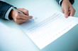 © Nonwarit - Business man signing a contract