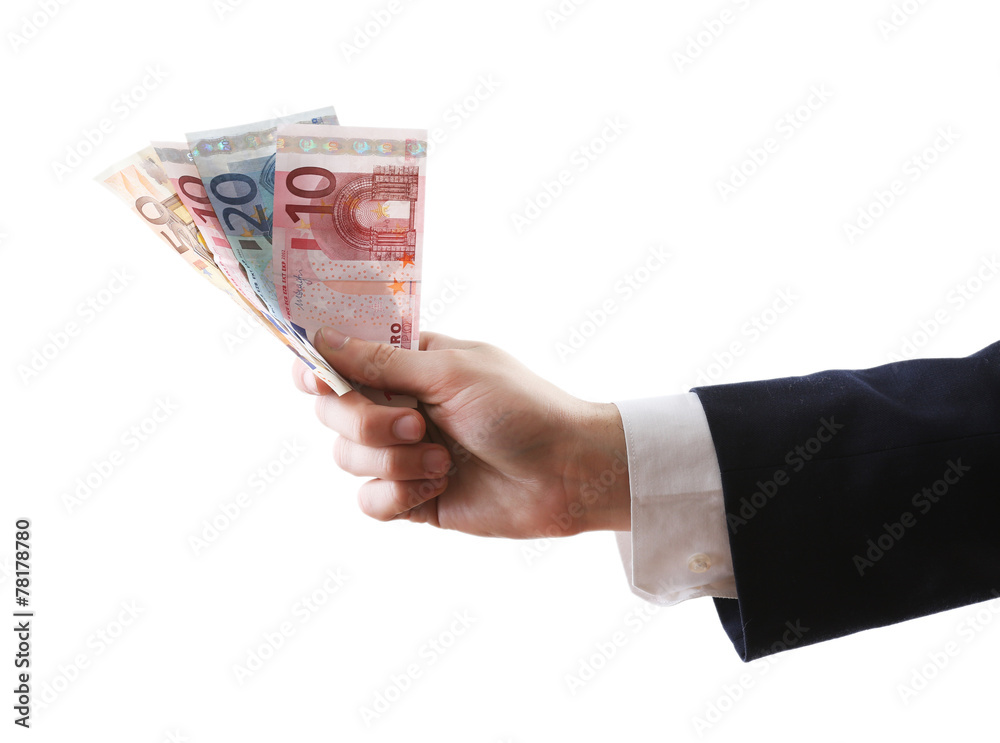 Hand with money isolated on white