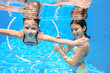 © Iuliia Sokolovska - Kids swim in pool underwater, girls swimming and having fun