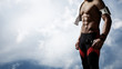© SFIO CRACHO - Athletic man on blue sky background