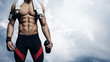 © SFIO CRACHO - Strong athlete on blue sky background