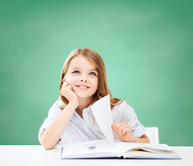 Canvas Print - happy student girl with book at school