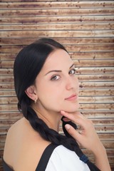 Wall Mural - Composite image of pretty oktoberfest girl smiling at camera