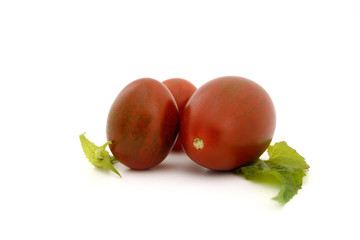 Chocolate Tomato or Brown color tomato isolate on white backgrou