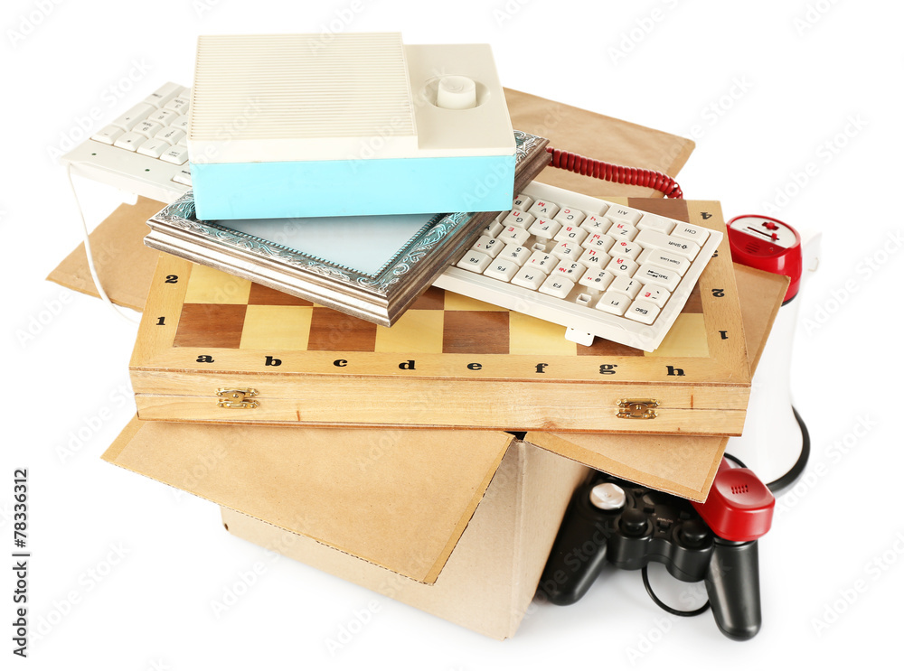 Box of unwanted stuff isolated on white