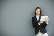 © BGStock72 - Young woman with tablet