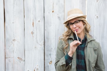 Poster - Portrait of blonde in hat posing and holding