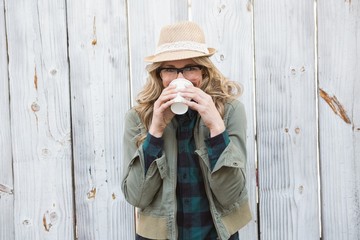 Poster - Portrait of blonde drinking from disposable cup