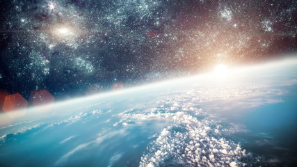 Wall Mural - planet earth and the sun as seen from space.