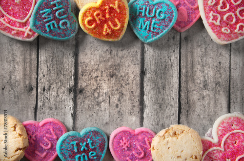 Nowoczesny obraz na płótnie valentine's day cookies on a rustin wood table