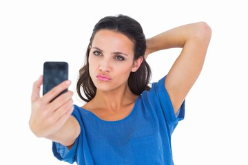 Poster - Pretty brunette taking a selfie