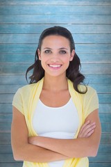 Poster - Composite image of pretty brunette smiling at camera
