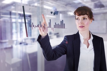Poster - Composite image of businesswoman pointing