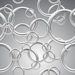 Wall Mural - seamless background of metal rings.