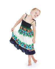 Cheerful girl in a long summer sundress.