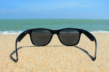 Wall Mural - Sunglasses on the beach