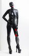 © Richard Semik - standing woman wearing latex clothes with handcuffs