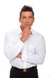 © petrdlouhy - Portrait of handsome thinking businessman in white shirt
