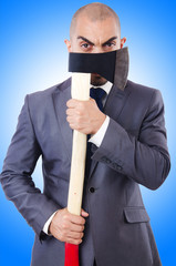 Funny businessman with axe on white